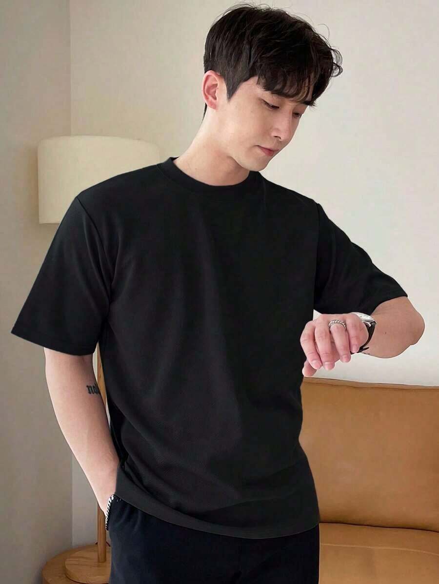 Hombres Camiseta unicolor de cuello redondo - Negro - Ver 1