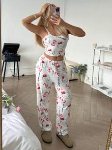 SANRIO Bộ đồ ngủ nữ 2 món in hình Hello Kitty gồm áo hai dây croptop và quần ống đứng cạp chun, kiểu dáng dễ thương. - trắng - Xem 5