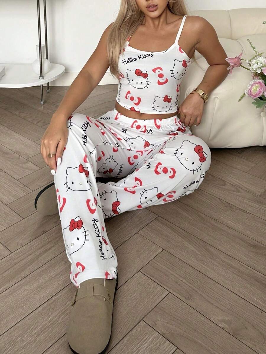 SANRIO Bộ đồ ngủ nữ 2 món in hình Hello Kitty gồm áo hai dây croptop và quần ống đứng cạp chun, kiểu dáng dễ thương.