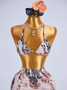 Conjunto de biquíni com estampa de leopardo, composto por top e saia midi justa. Look casual, sexy e confortável para férias, festas, Dia das Mães, shows, estilo urbano, aniversários, baladas, festivais e para a primavera, verão e outono. - Multicolorido - Ver 6