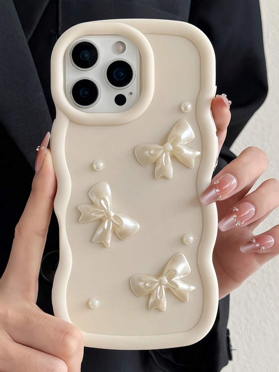 1 chiếc ốp lưng điện thoại cao cấp màu trắng kem, thiết kế nơ ngọc trai 3D, viền lượn sóng, chống sốc, chống trượt và chống trầy xước, độc quyền cho iPhone 17 Pro Max, tương thích với các dòng 17/16/15/14/13/12/11, S20-S25, Note 14/13/12 & A56 5G, món quà hoàn hảo cho Ngày Valentine/ Sinh nhật/ Năm mới dành cho phái nữ và các bạn gái. - trắng - Xem 1