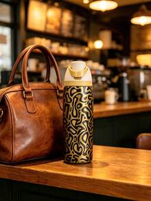 OwaIa Golden Leopard Print Large Capacity Stainless Steel Water Bottle,32oz/945ml,With A Straw,Exquisite Appearance,Keeps Drinks Hot Or Cold,Can Hold Iced Drinks And Water,Suitable For Leisure,Work,Sports,Indoors And Outdoors,Perfect Gift Choice.Vacuum Flasks-Everyday Tumbler-Perfect Birthday Gift-Father Day Tumbler - họa tiết da báo vàng - Xem 1