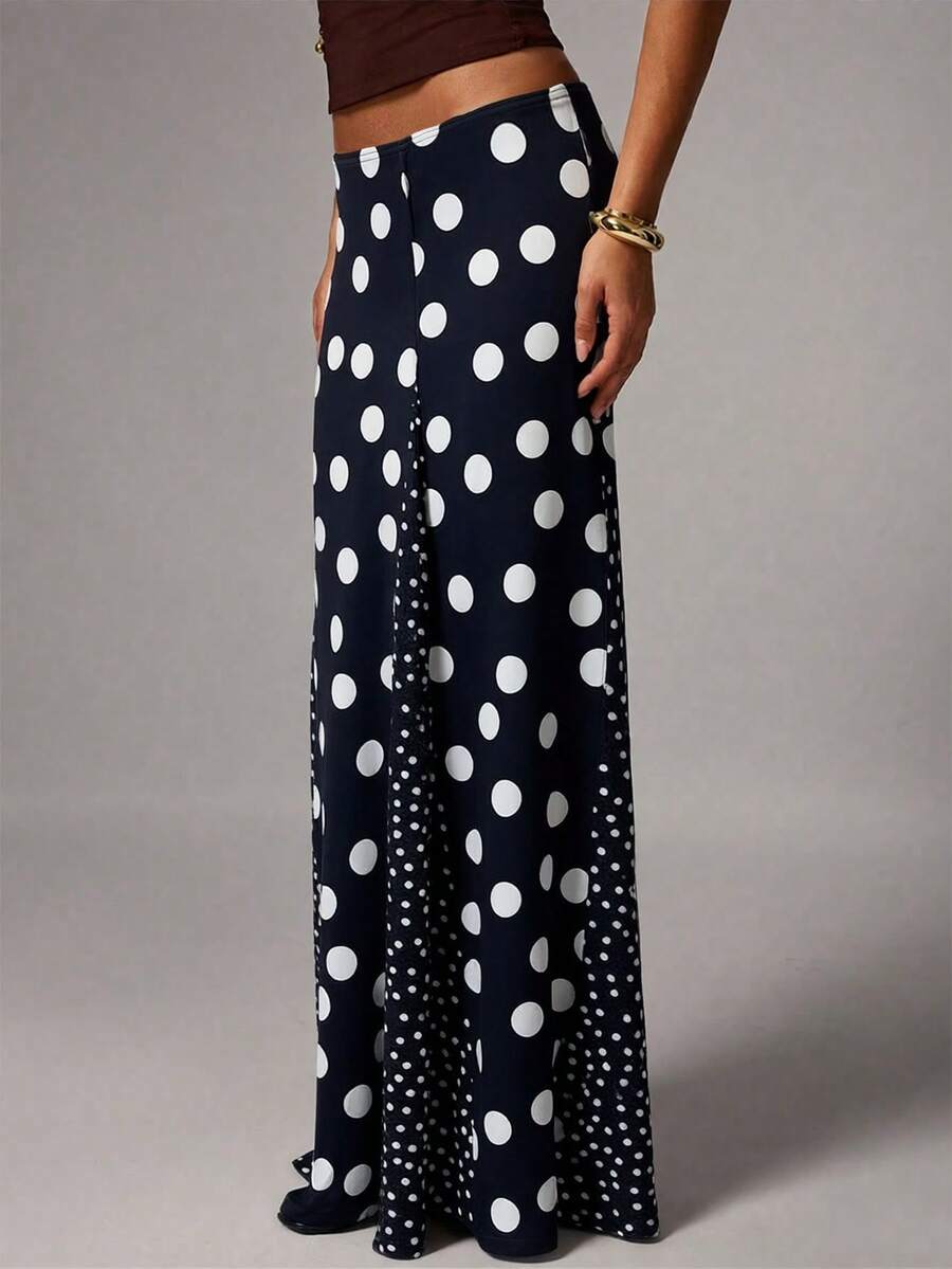 Chân váy dài chấm bi nữ mùa xuân/hè mới, thanh lịch và thoải mái - Thiết kế xẻ tà phối nhiều mảng màu, họa tiết chấm bi pha trộn, xếp ly eo, dáng chữ A nhẹ, chất liệu vải dệt kim mỏng co giãn. - Nhiều màu - Xem 1