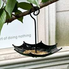 1 chiếc máng ăn chim hình ô, bát đựng thức ăn cho chim treo ngoài trời, bình tưới nước chống thời tiết cho ban công và sân vườn. - máng ăn hình dù - Xem 2
