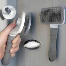 1 pieza Cepillo para mascotas de autolimpieza, púas de acero inoxidable curvadas, cepillo de desensedado de mascotas con un solo botón, elimina eficazmente el pelo de las mascotas, adecuado para el cuidado diario y festivo de gatos y perros - Rosa - Ver 2