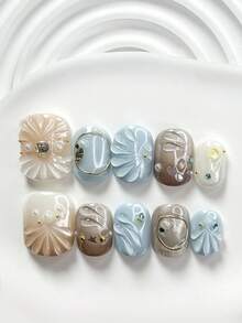 Bộ dụng cụ làm móng nghệ thuật thủ công phong cách rừng xanh 10 món, bao gồm bộ dụng cụ làm móng gel, kim cương hình trái tim màu sâm panh, kim tuyến hình ngôi sao năm cánh màu bạc, mảnh vỏ sò lấp lánh, họa tiết lượn sóng vẽ tay, phụ kiện móng mắt mèo màu bạc, phong cách disco glam, kèm dụng cụ làm móng (1 miếng dán gel + 1 dũa móng), phù hợp với móng vuông, vuông ngắn và hình hạnh nhân, thích hợp cho các bữa tiệc, sử dụng hàng ngày, lễ kỷ niệm, chụp ảnh, đi làm mùa xuân/hè. - Nhiều màu - Xem 14