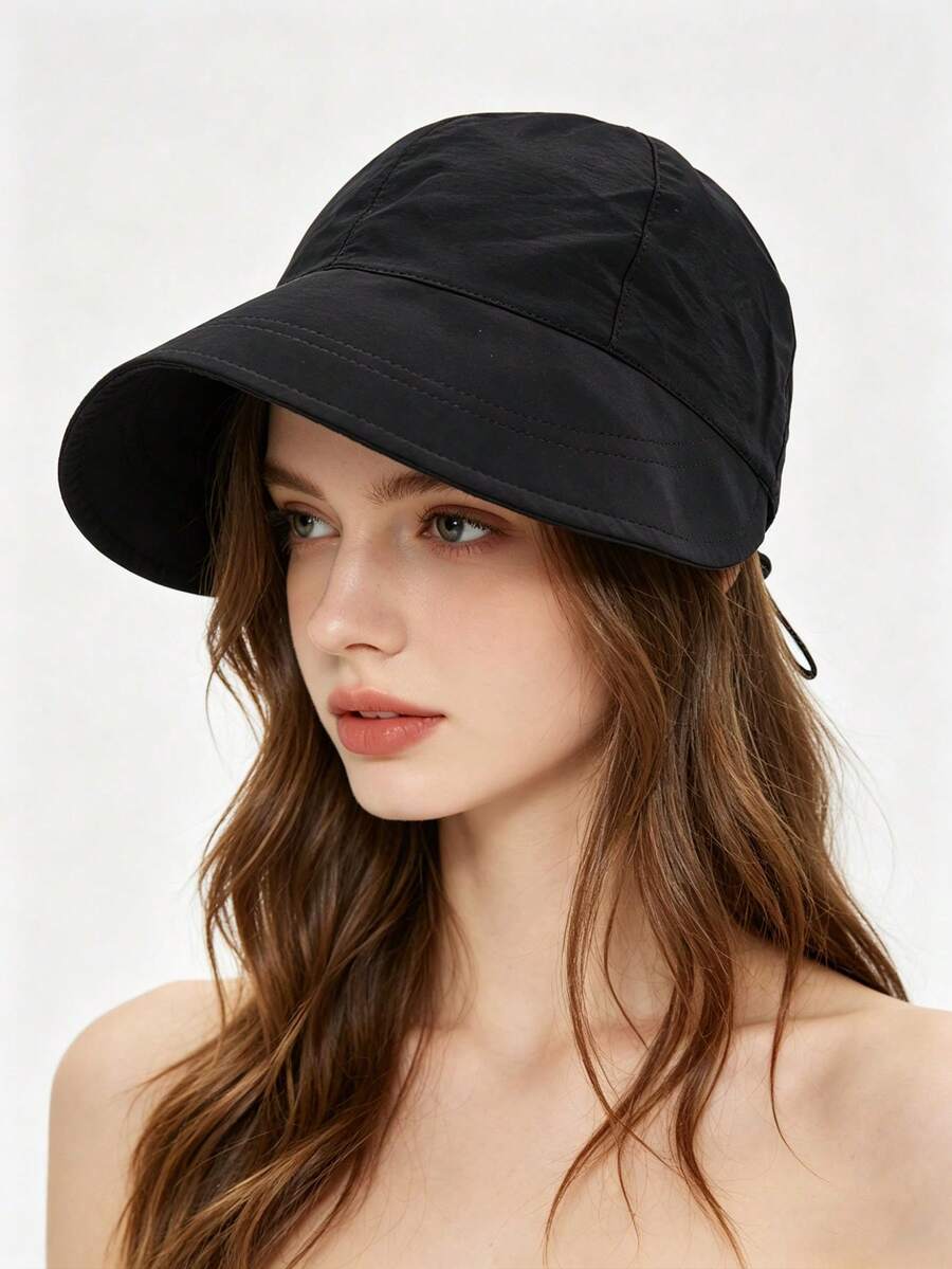 Un sombrero de pesca elegante y minimalista, adecuado tanto para hombres como para mujeres. Ideal para actividades al aire libre y salidas de verano. - sombrero - Ver 1