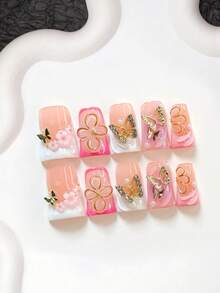 10件套甜美公主风手工美甲套装，包含凝胶美甲套装、金色水钻蝴蝶、粉色山茶花美甲装饰、手绘纯色波浪纹图案、手工金边花朵、粉色指甲油，以及美甲工具（1个果冻贴+1个指甲锉）。提供杏仁形、鸭嘴形和棺材形三种款式。适合派对、日常佩戴、聚会、拍照、约会、春夏通勤等各种场合。按压式美甲贴片。 - 彩色 - 查看 14