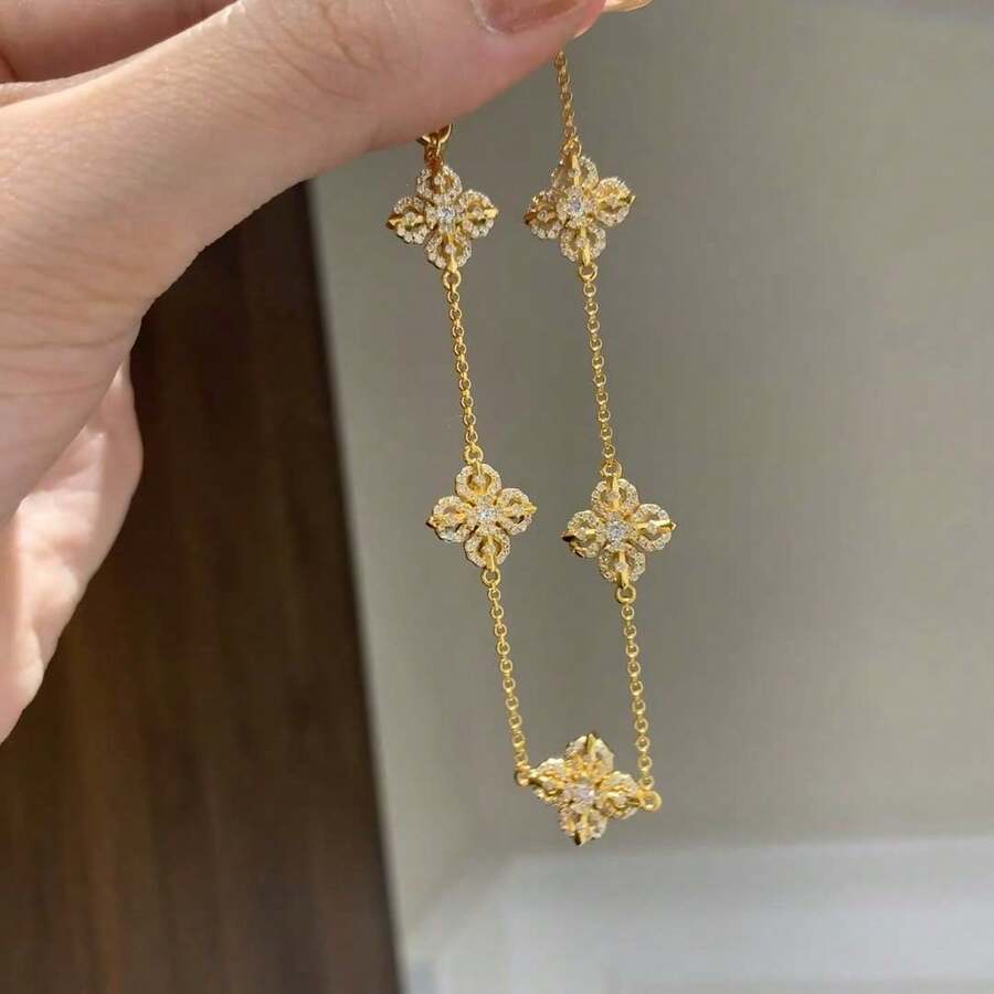 سوار الصليب الماسي ذو الوجه الواحد للنساء، مجوهرات الفاجرا الحمراء الكلاسيكية اللامعة - سوار من خمس زهور - مشاهدة 1