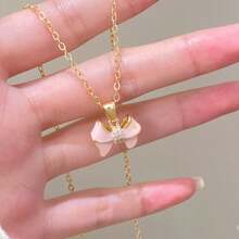 Dây chuyền mặt nơ đính đá Zirconia FICCINO, dây thép mạ vàng hình chữ O, có thể điều chỉnh độ dài, món quà dễ thương ngọt ngào dành cho các cặp đôi. - 1516n - Xem 4