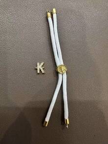 色彩缤纷的新款时尚字母手链，26个镶嵌锆石的字母，可调节编织绳手链，女士珠宝礼品 - 彩色 - 查看 51