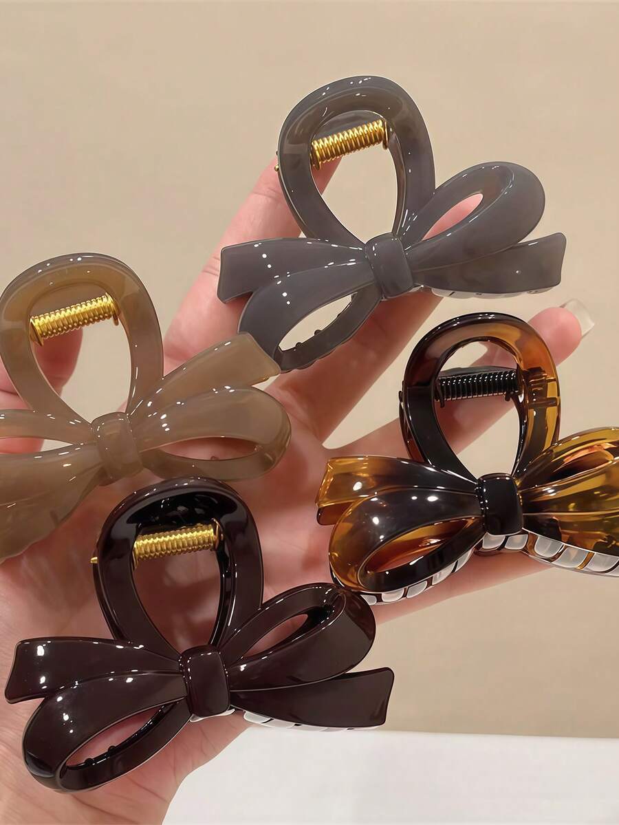 新款高端时尚发夹，后脑勺处饰有蝴蝶结扣。鲨鱼造型发饰发夹。夏季沙滩装扮必备，度假风发夹。 - 彩色 - 查看 1