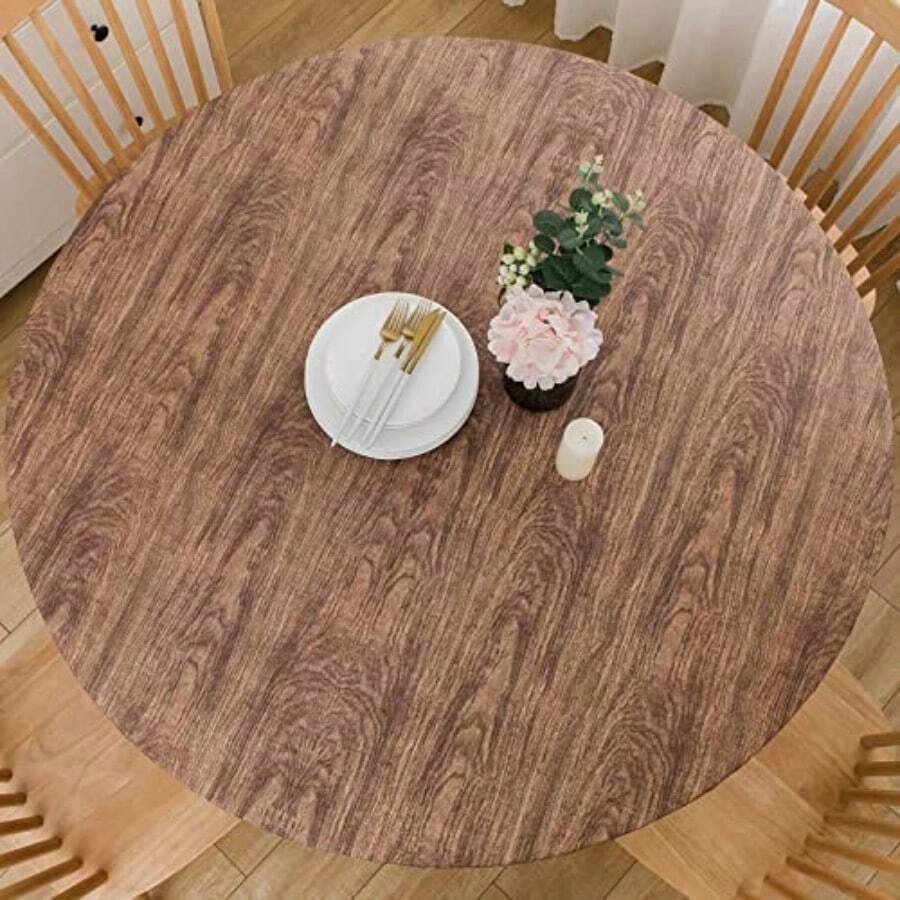 LIBERECOO Mantel redondo ajustable de vinilo con respaldo de franela resistente a manchas y lavable para mesas redondas de 45 a 56 pulgadas - Madera la más bien - Ver 1