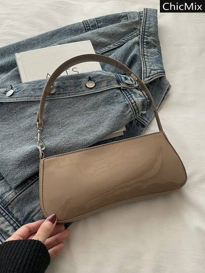 纯色百搭质感漆皮亮面简约手提包，采用柔软光滑的皮革，是一款流行的女士单肩腋下包，适合购物、携带钱包、休闲出行，尤其适合年轻女性、大学生、职场新人以及白领人士。这款包非常适合办公室、大学校园、工作、商务出行、通勤、户外活动、旅行和郊游等场合。