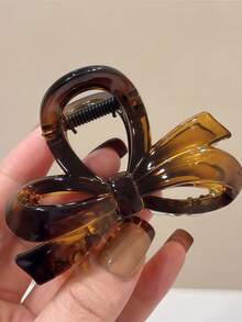 新款高端时尚发夹，后脑勺处饰有蝴蝶结扣。鲨鱼造型发饰发夹。夏季沙滩装扮必备，度假风发夹。 - 彩色 - 查看 5