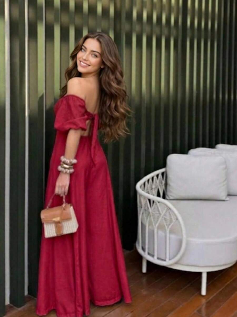 The Look That Translates Tropical Elegance With Attitude! The Itacaré Jumpsuit Is Pure Charm For Stylish Summer Days. Features Include Puff Sleeves And An Off-The-Shoulder Neckline. A Tie Detail At The Back Flatters The Silhouette. Comfort And Visual Impact In A Single Piece. - 紅色 - 查看 1