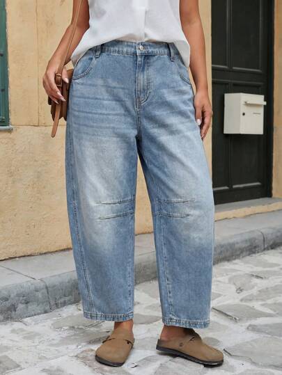 复古高腰灯笼裤，浅蓝色水洗宽松版型设计，适合大码女性日常通勤和休闲外出穿着。