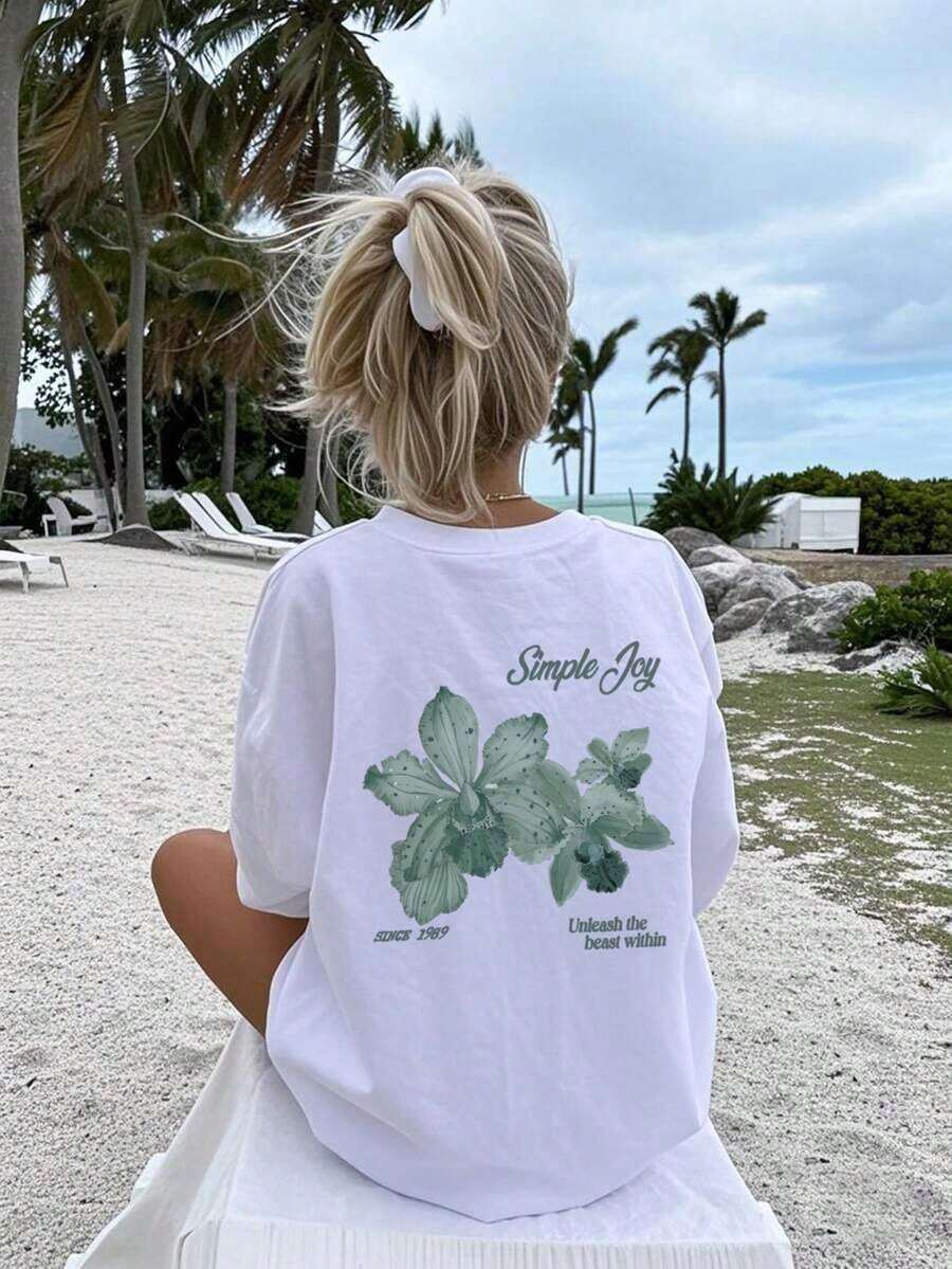 This Crew Neck T-Shirt With A Colorful Letter And Floral Print Is A Fashionable And Versatile Choice For Women In Summer. The Graphic Tee Comes In White And Pink, Perfect For Vacation Wear. CasualPure-Pure Cotton - 白色2 - 查看 1
