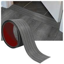 1 miếng nẹp chân tường tự dính linh hoạt, kích thước 1m x 4cm, dùng để che khe hở giữa gạch lát sàn và thảm. - A - Xem 3