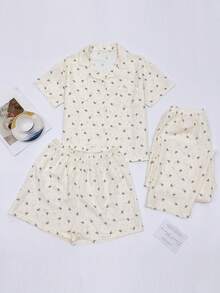 3 piezas Conjunto de pijama casual con estampado de moños negros para mujer, cómodo cárdigan de manga corta, top con cuello y pantalones/shorts sueltos, adecuado para fiestas, ropa de estar en casa para todas las estaciones - Beis - Ver 1