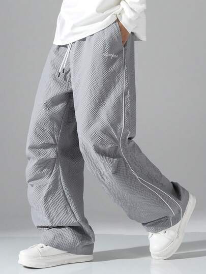 กางเกงลำลองผู้ชาย, กางเกงขายาวทรงตรงหลวมเอวยางยืดผ้าบับเบิ้ลสีพื้น, เหมาะสำหรับใส่ลำลอง/เล่นกีฬาในฤดูใบไม้ผลิ ฤดูใบไม้ร่วง และฤดูร้อน