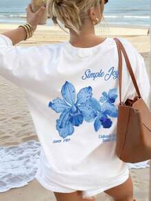 This Colorful Crew-Neck Shirt, Adorned With Floral And Lettering Prints, Is A And Versatile Option For Women. The Graphic Shirt Is Available In White And Other Colors, Ideal For Vacations. Casual - Apricot 2 - View 7