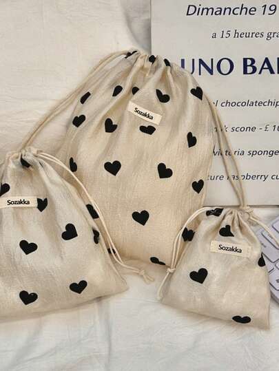 心形抽绳袋，束口收纳挂袋，心形图案收纳袋，黑色心形印花抽绳收纳袋，便携式亚麻防尘袋，多尺寸旅行化妆品收纳袋，小物件收纳袋，抽绳收纳袋，心形束口袋，便携式旅行洗漱用品收纳袋，可重复使用的化妆洗漱包，可爱束口袋，旅行必备配件