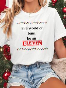Women's Eleven-Inspired T-Shirt, Short Sleeves, Crew Neck - White, Lightweight, For Spring/Summer, Casual, For Holiday Parties - Fan Outfit - Fantasy Christmas Design And Iconic Quote - Machine Washable, Comfortable Casual Wear. Graphic Tee With Illustrations Inspired By Eleven, Featuring Gorgon, Mike, Lucas, Eleven, Dustin, Demo Dogs, Hawkins, And India.Na Jones Fans. Exquisite T-Shirts, Holiday T-Shirt. - White - View 1