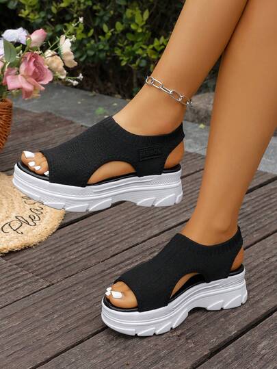 Sandal thể thao đế cao thoáng khí dệt kim thời trang mới năm 2026 dành cho nữ.