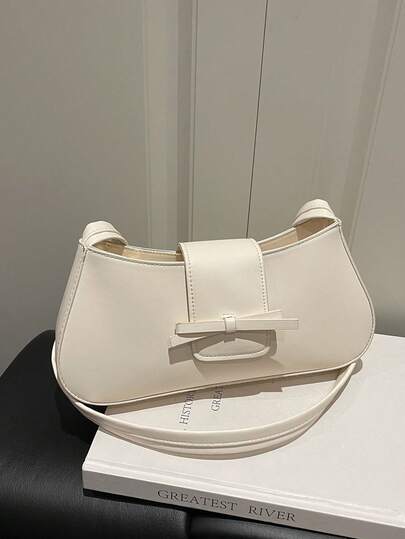 新款复古时尚单肩腋下包，蝴蝶结装饰，拉链开口，轻便简约，纯色软法棍包