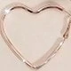 Oro rosa con forma de corazón