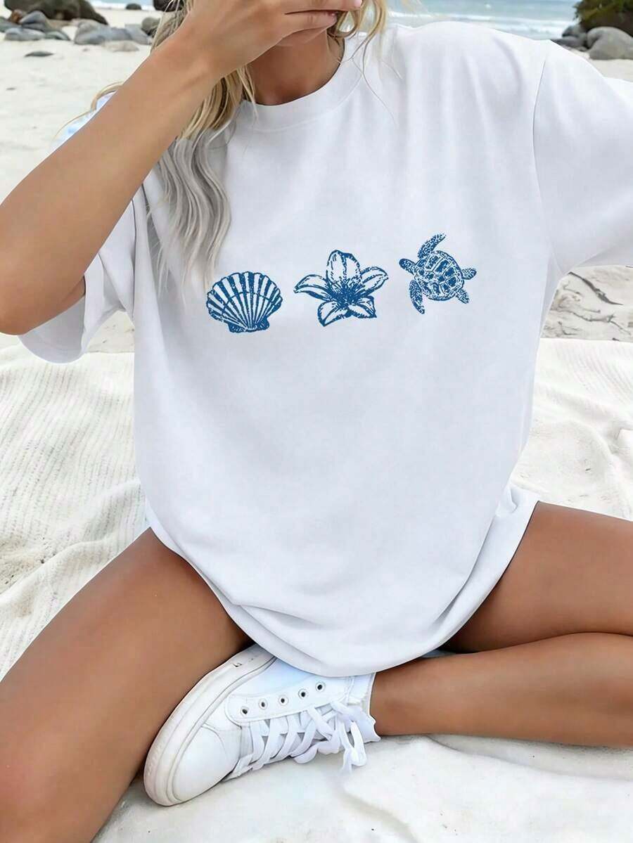 Camiseta de manga corta de verano para mujer, de ajuste holgado, con cuello redondo, en color azul claro, con estampados casuales de letras, animales marinos, caparazón de tortuga y flores, ideal para uso diario y vacaciones - Blanco - Ver 1