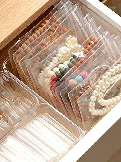 100个可重复使用透明PVC首饰袋，可重复密封首饰收纳袋，首饰袋，抗氧化首饰袋，可重复使用首饰包装袋，便携式防水首饰袋，防褪色优质首饰收纳袋 - 小巧透明，可用于存放耳环、项链、手链、戒指和其他小礼物，也可作为文具袋、家居用品，适合作为母亲节礼物、圣诞礼物、万圣节礼物、返校必备品和返校礼物。
