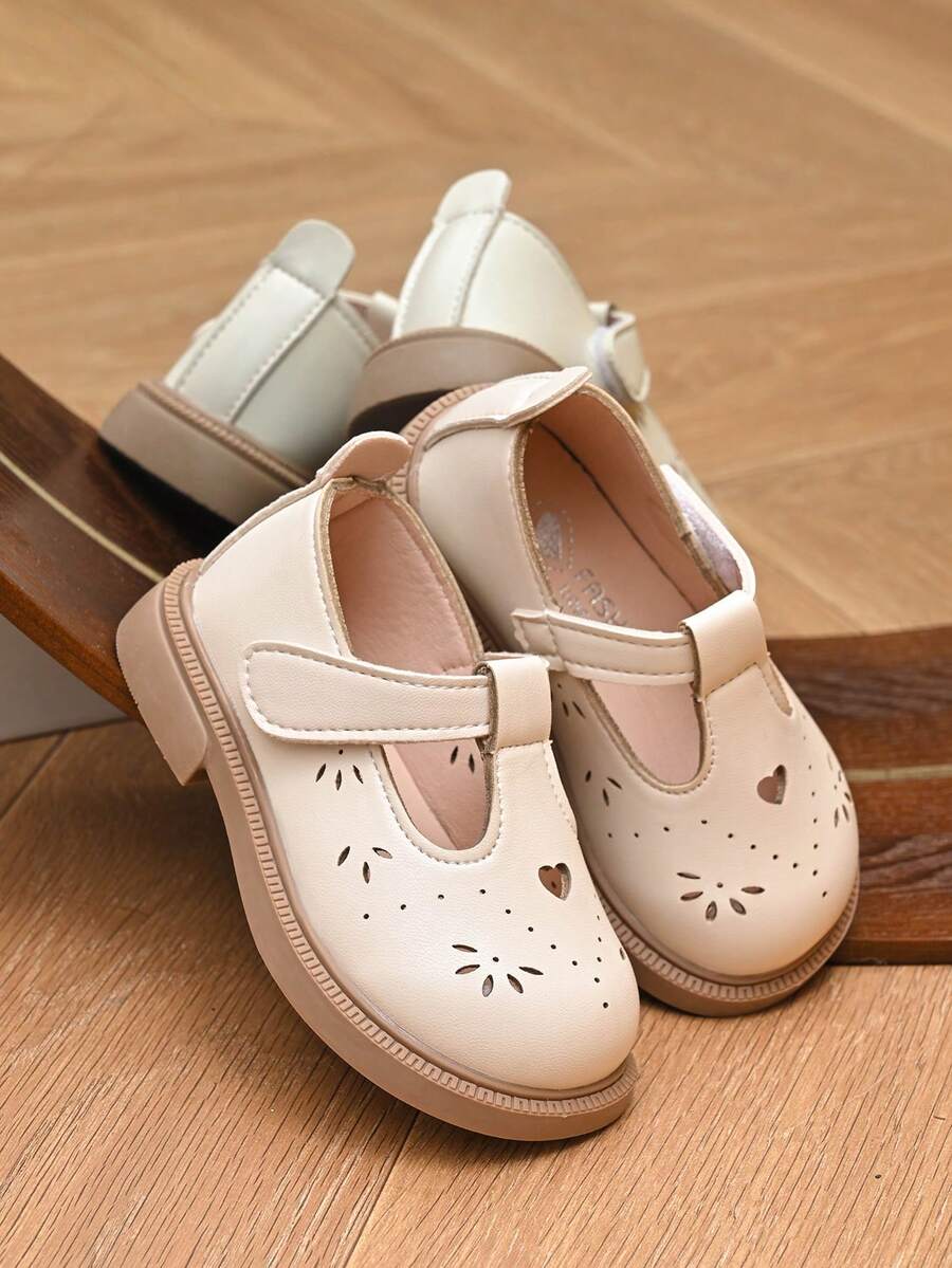 幼童女童舒適實用愛心鏤空透氣瑪麗珍鞋,T型綁帶設計,柔軟防滑鞋底,防撞鞋頭,適合學校、戶外玩耍、休閒穿著,軟底運動鞋,防滑兒童鞋,易穿脫休閒鞋,兒童公主鞋 - 米色 - 查看 1