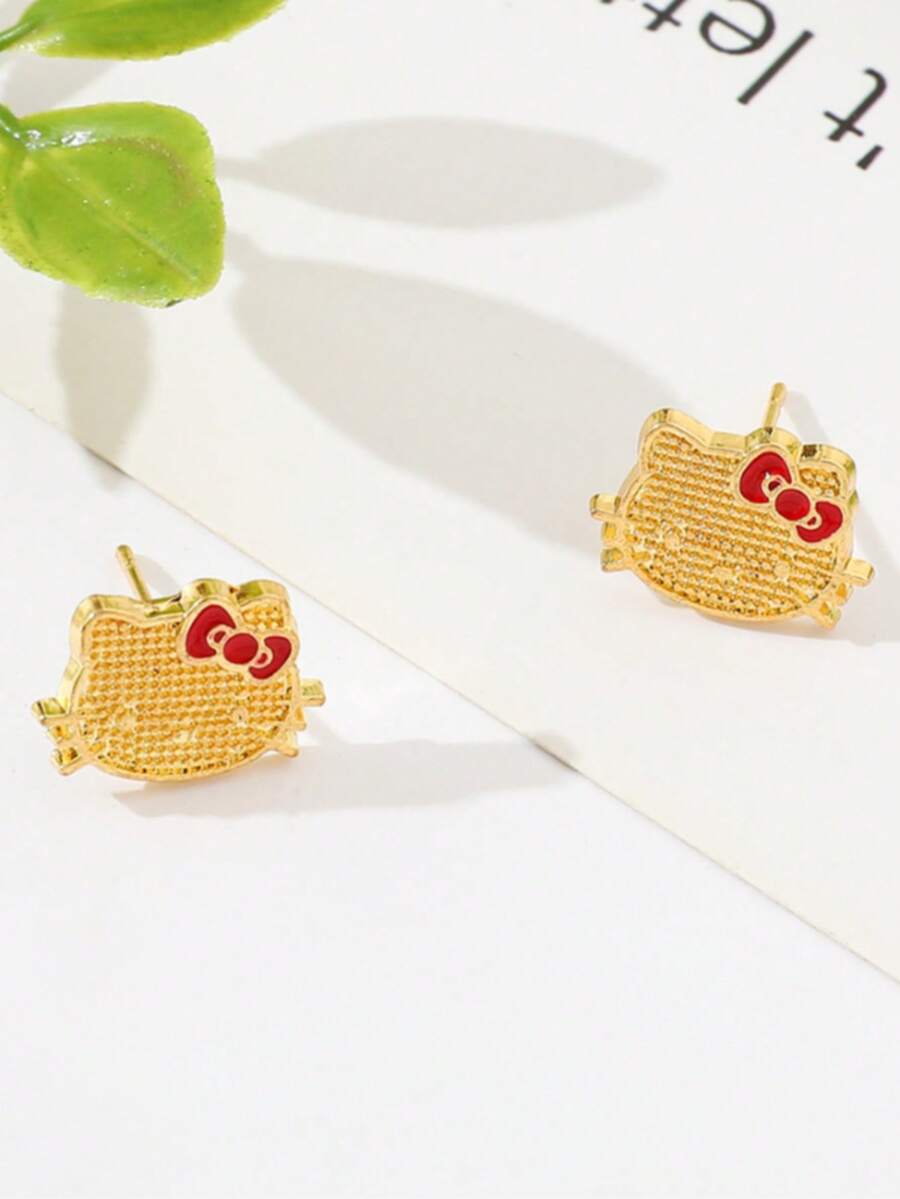 SANRIO 1 par de pendientes de aro con diseño de oreja de gato con lazo rojo, diseño dulce adecuado para uso diario de mujeres - Dorado - Ver 1