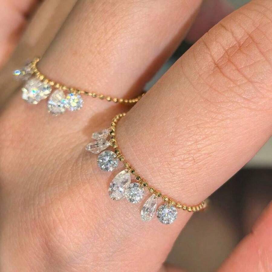 Nhẫn có thể điều chỉnh kích cỡ với mặt dây chuyền hình giọt nước bất đối xứng thanh lịch, đính đá Cubic Zirconia lấp lánh - Phụ kiện thời trang dành cho giới trẻ, trang sức thiết kế cao cấp. - nhẫn - Xem 1