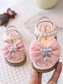 一双可爱时尚的按摩垫平底儿童凉鞋，柔软防滑，适合幼儿学步，春、夏、秋、冬四季穿着。 - 粉色 - 查看 1