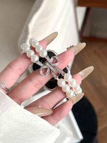 1 chiếc dây đeo đồng hồ nữ thời trang đính ngọc trai và đá quý hình nơ, phù hợp với đồng hồ Ultra2/Ultra/SE/10/9/8/7/6/5/4/3/2/1 kích thước 38/40/41/42/44/45/49/46mm, màu trắng, dành cho ngày Valentine. - Pearl White - Xem 3