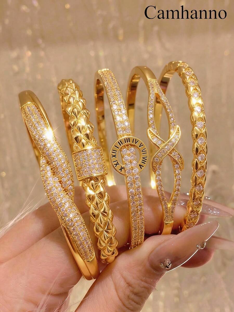 Bộ 5 vòng tay bằng đồng, gồm 5 chiếc vòng nhỏ để phối hợp, được trang trí bằng các chi tiết khảm và nút thắt vô cực, phù hợp cho đi làm hàng ngày, những buổi hẹn hò ngọt ngào, các bữa tiệc ngày lễ và các dịp trang trọng. Một món quà quý giá dành cho bạn bè và đồng nghiệp sành điệu. Chống oxy hóa, bền, nhẹ và thoải mái khi đeo cả ngày. - Vàng - Xem 1