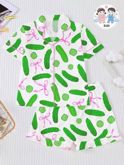 2pcs Cartoon Cucumber & Bow Print Kids Pajama Set, New Flame Retardant Fabric Collared Short Sleeve Cardigan And Elastic Waist Shorts Casual Comfortable Homewear Outfit, Suitable For Children And Teenagers Daily Fashion, Party, Vacation And Home Wear
