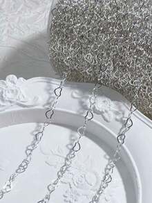 Dây chuyền dài 1m bằng thép không gỉ, hình trái tim rỗng, mạ vàng, có thể dùng để tự làm vòng cổ, vòng tay, lắc chân. - Sáng - Xem 9