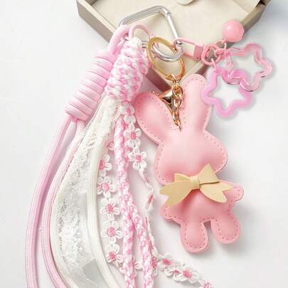 Móc khóa hình thỏ Coquette Aesthetic bằng da PU giả, mặt dây chuyền hình thỏ với nơ, tua rua ren và dây trang trí hoa, chuông và ngôi sao, dây đeo bện, móc khóa hình thỏ nơ, phụ kiện túi xách, ba lô, mặt dây chuyền hình ngôi sao phong cách Y2K, móc khóa ví, dây đeo tua rua ren, mặt dây chuyền hình ngôi sao, quà tặng sinh nhật, quà tặng Valentine, quà tặng Phục sinh.