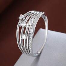 1 chiếc nhẫn nữ thiết kế mặt rộng kết hợp các đường hình học, đính đá Cubic Zirconia. - Nhiều màu - Xem 11