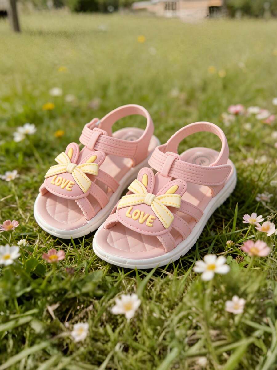 Giày sandal công chúa cánh trái tim thời trang mới năm 2026 cho bé gái, đế mềm bền chắc, hở mũi, thích hợp cho bé gái và trẻ nhỏ, kiểu dáng ngọt ngào, đa năng, phù hợp mang hàng ngày. - Hồng - Xem 1