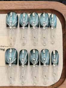 10片闪亮蓝绿色猫眼美甲贴片，优雅银色网状和钻石细节，可重复使用，适合派对和日常佩戴。 - 藍色 - 查看 1