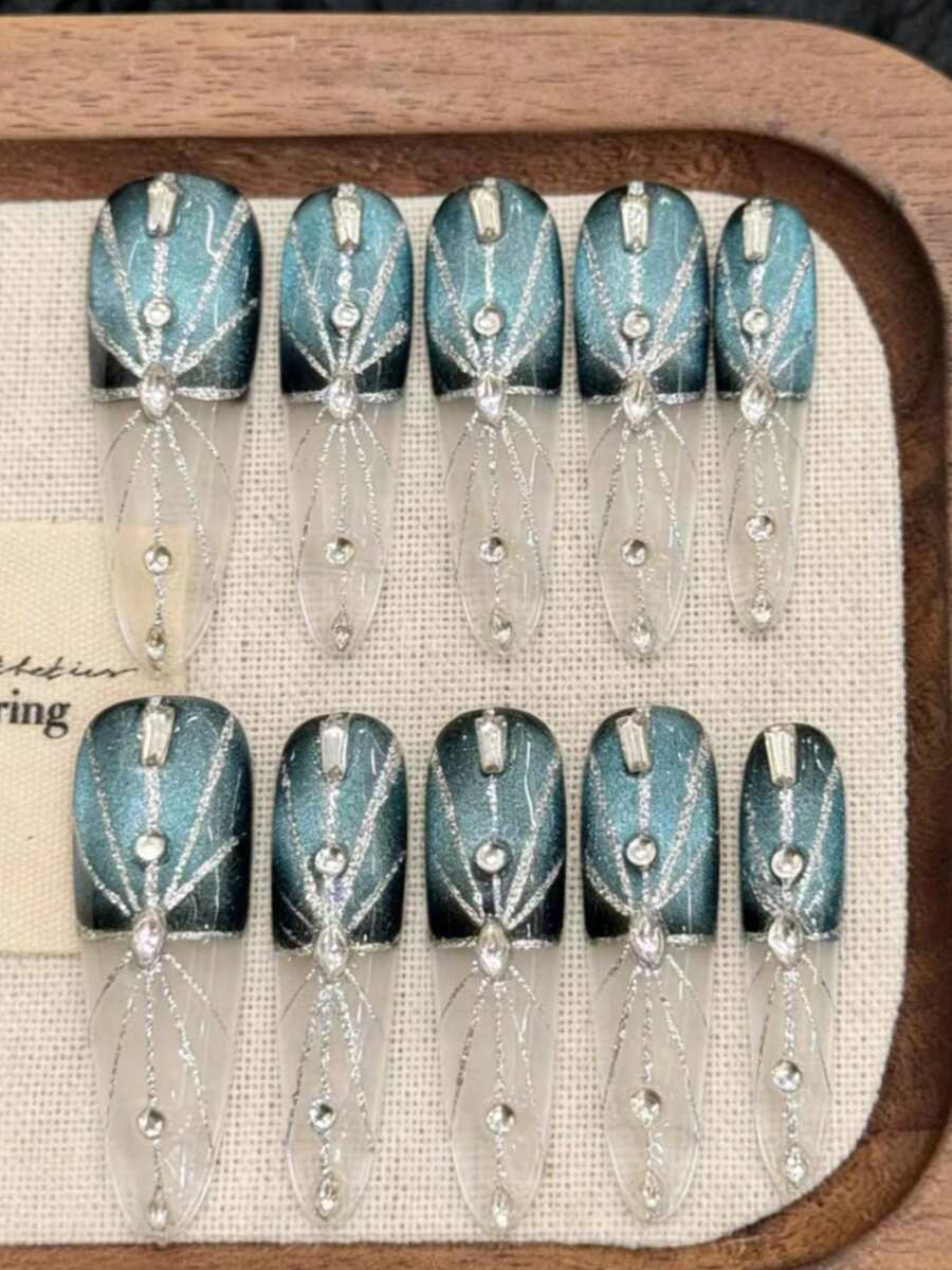 10片闪亮蓝绿色猫眼美甲贴片，优雅银色网状和钻石细节，可重复使用，适合派对和日常佩戴。 - 藍色 - 查看 1