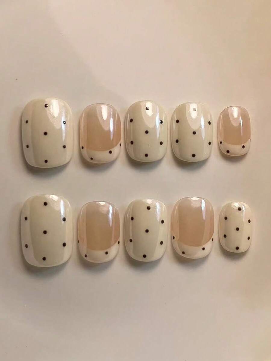 10片纯手工制作的按压式美甲片，短款椭圆形美甲，白色美甲，温柔甜美风格，裸粉色搭配白色法式尖，手绘黑色波点，简约可爱百搭的按压式美甲片，适合女性和女孩，春夏秋冬节日派对及日常生活使用。 - 白色 - 查看 1