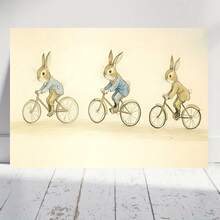 Impresión en Lienzo con Marco de Madera -  Montando Bicicleta, Decoración Vintage para Guardería, Ilustración Caprichosa de Conejo para Dormitorio, Sala de Estar o Oficina en Casa, Arte de Pared para Guardería | Decoración Caprichosa | Decoración Artística de Pared, Decoración de Conejos - Enmarcado - Ver 1