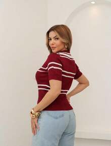 Transforme seu look com a blusa modal manga curta que combina sofisticação e conforto na medida certa! Com um caimento impecável e detalhes texturizados. Essa peça é perfeita para quem busca um visual moderno e estiloso. Modelo Importado, Malha Grossa Qualidade Exelente - Vermelho - Visão 2