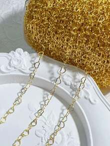 Dây chuyền dài 1m bằng thép không gỉ, hình trái tim rỗng, mạ vàng, có thể dùng để tự làm vòng cổ, vòng tay, lắc chân. - Sáng - Xem 7